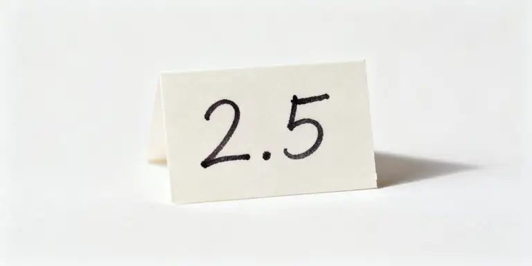 две целых пять десятых